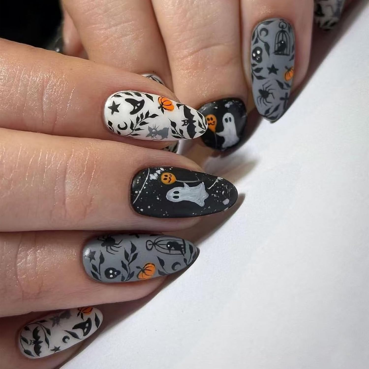 Halloween Press on Nails Medium Almond Fake Nails Cute False Nails with Ghost Pumpkin Spider Designs Black&White Stick on Nail Matte Glue on Nail for Women Girls 24Pcs
